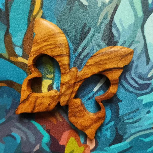 Butterfly with heart-shaped wings in olive wood by Wondiu