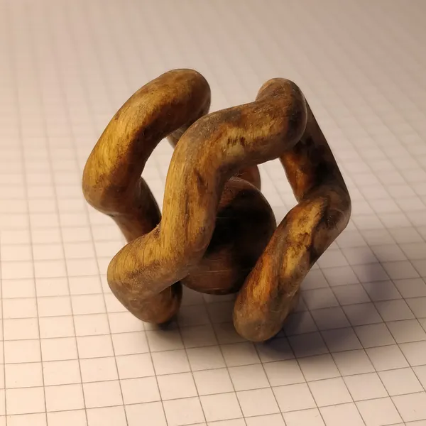 A ball trapped in an icosian cage, all carved from one piece of beech wood. by Wondiu