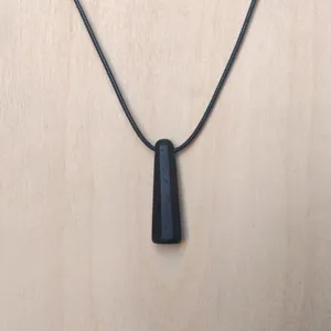 Leadwood cone pendant by Wondiu